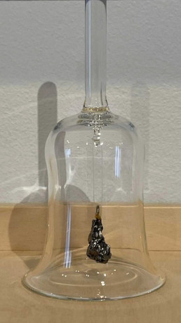 Amada Miller “Hollow Moon Rings Like a Bell”Glass, meteorite, iron filament Individual bell $525